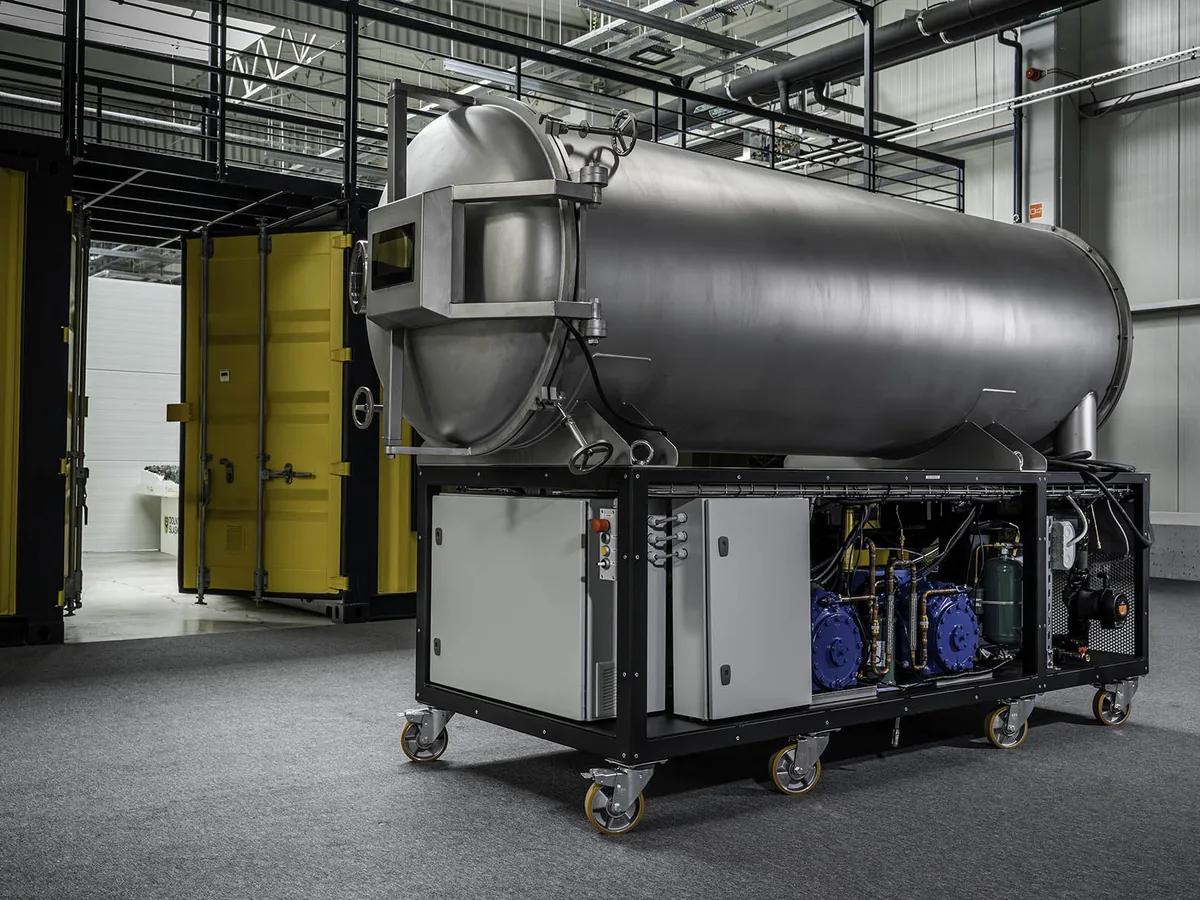 LEO-130 freeze dryer — three-quarter view of the full unit, refrigeration cabinet open